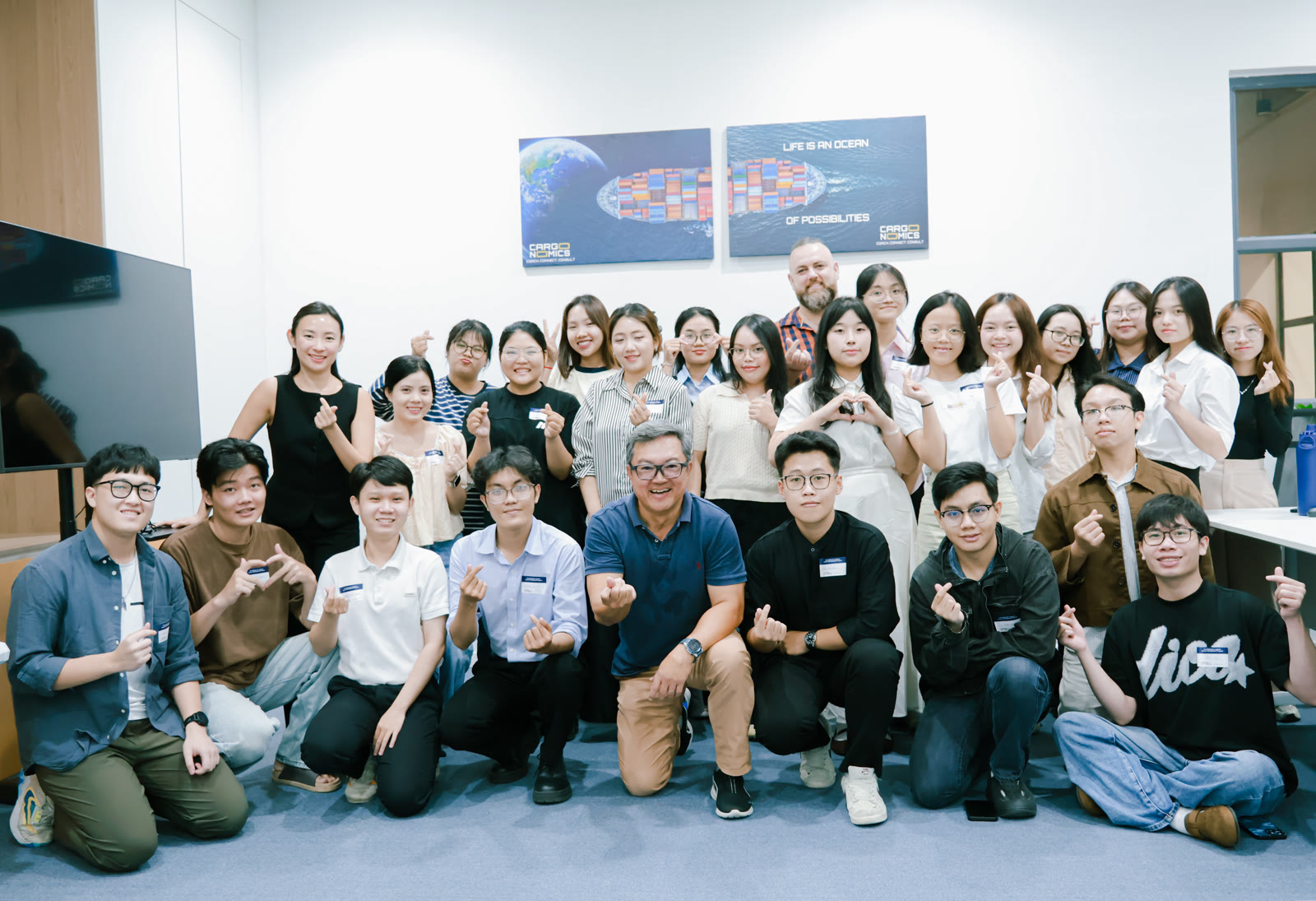 Cargonomics Shipping and Logistics Career Development Program cohort with their instructors at the HCMC training center